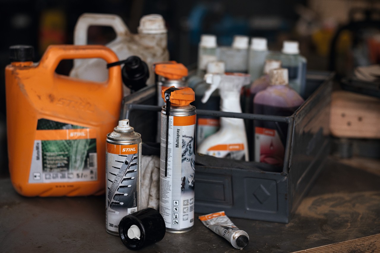 Various fuels and lubricants from STIHL, some of them in a box